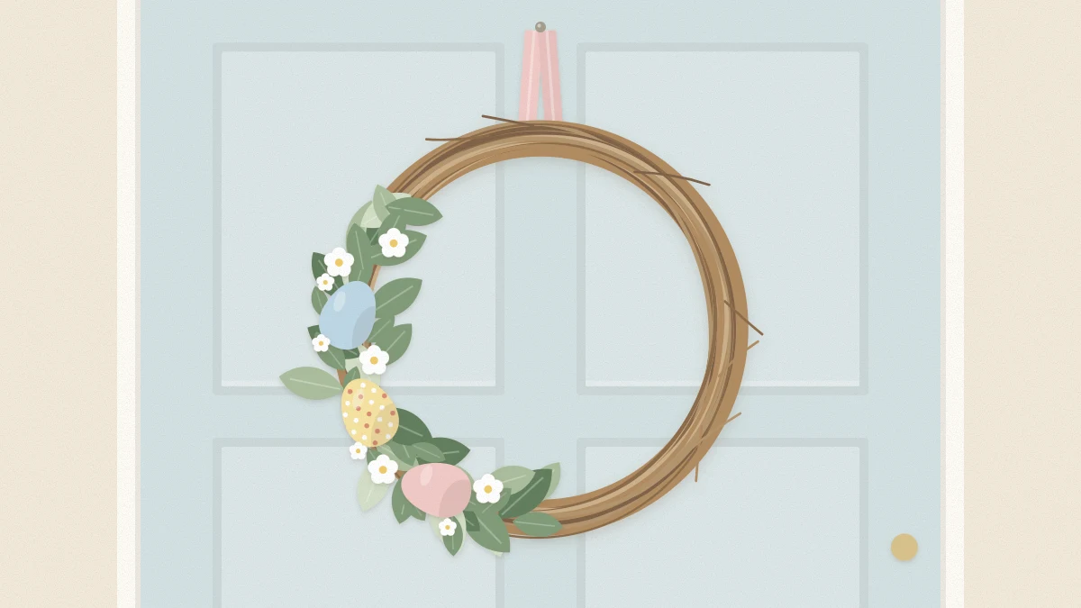 A grapevine wreath on a pale door with a crescent of greenery, white flowers and three pastel eggs