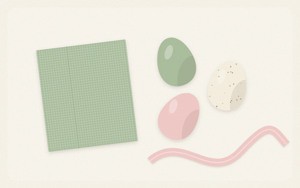 Three eggs, a ribbon and a folded napkin arranged in sage, cream and blush tones