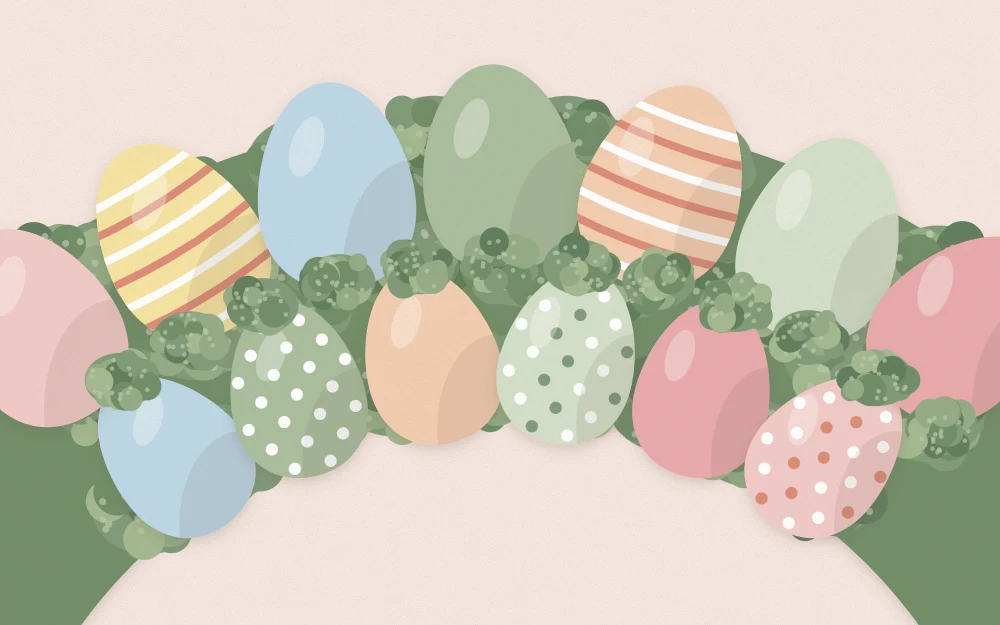 Close-up of two rows of pastel eggs on a wreath with green moss tucked into the gaps