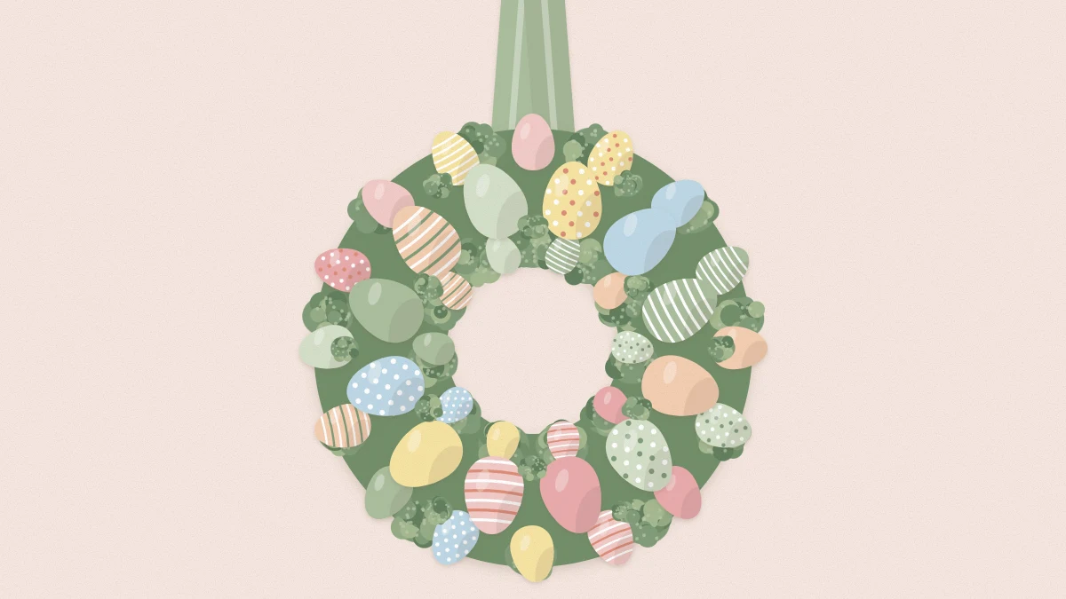 Round wreath of pastel eggs in three sizes with tufts of green moss, hanging from a wide ribbon