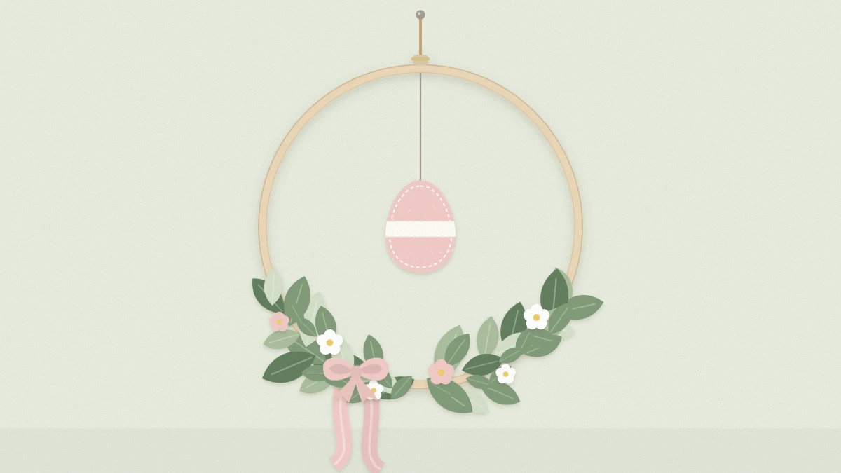 Wooden hoop wreath with greenery and small blossoms on the lower third, a hanging felt egg and long ribbon tails