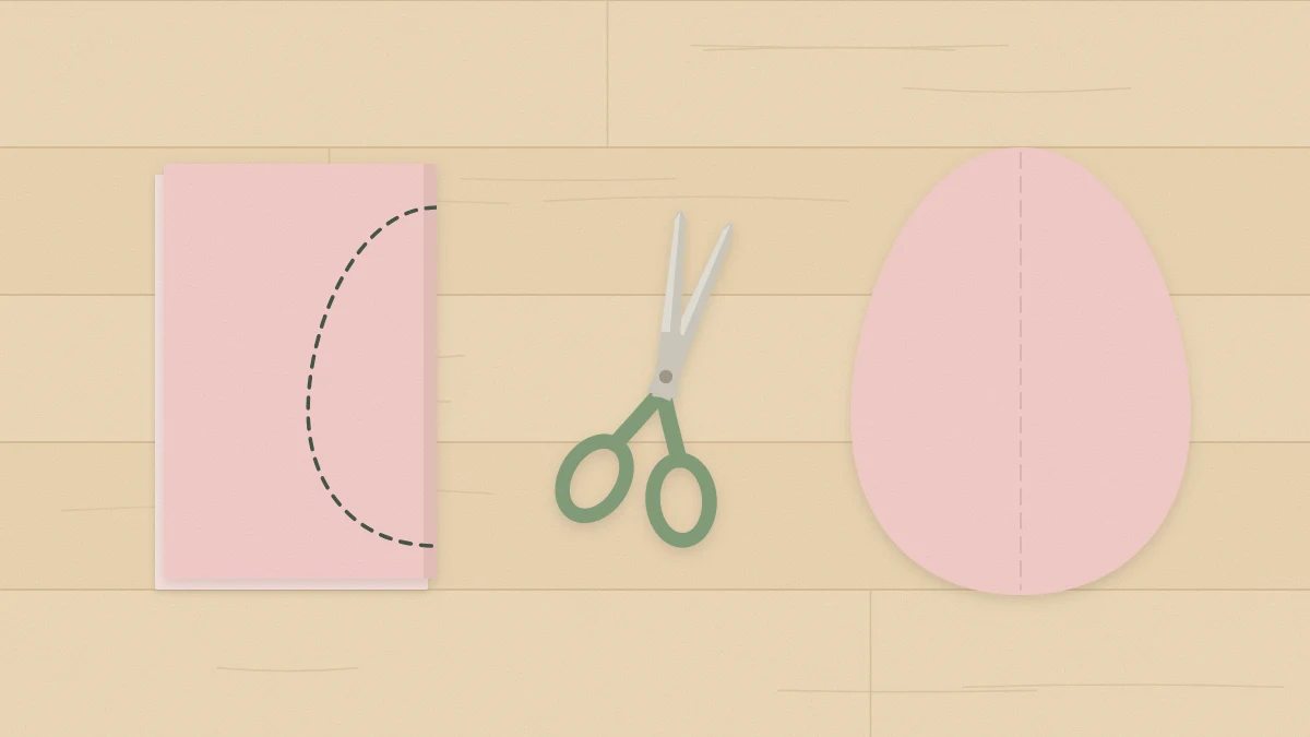 Folded paper with half an egg outline at the fold, scissors and an unfolded symmetrical paper egg