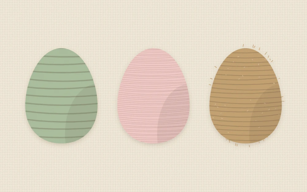 Three wrapped eggs with different textures: chunky yarn, thin smooth thread and rough jute twine